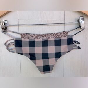 Acacia Swim Bottom. Black/Tan Size Med. Price Reflects Condition. Well Used.
